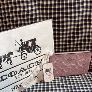 Coach lavender Signature Embossed Zip Wallet